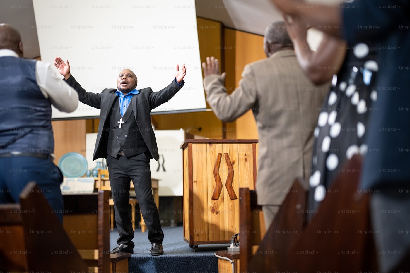 A family worshiping together in church
